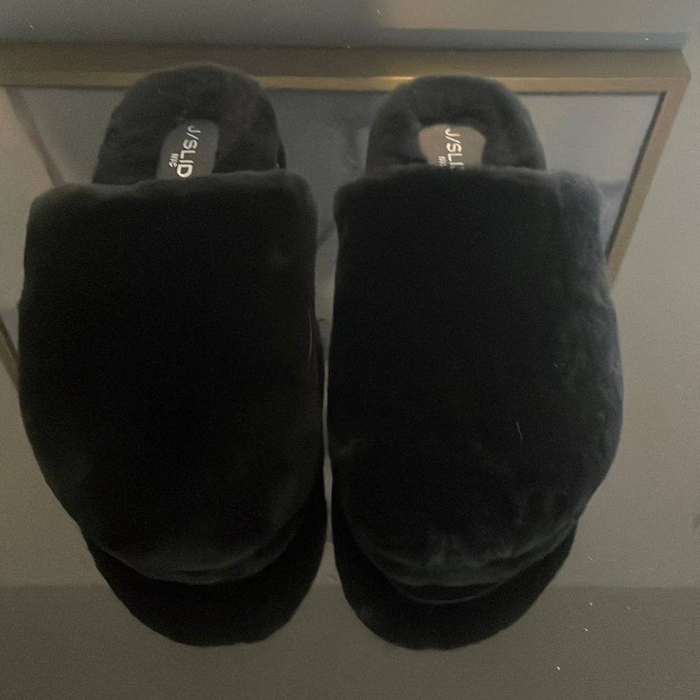 There are soft furry black slipper shoes from J Slides